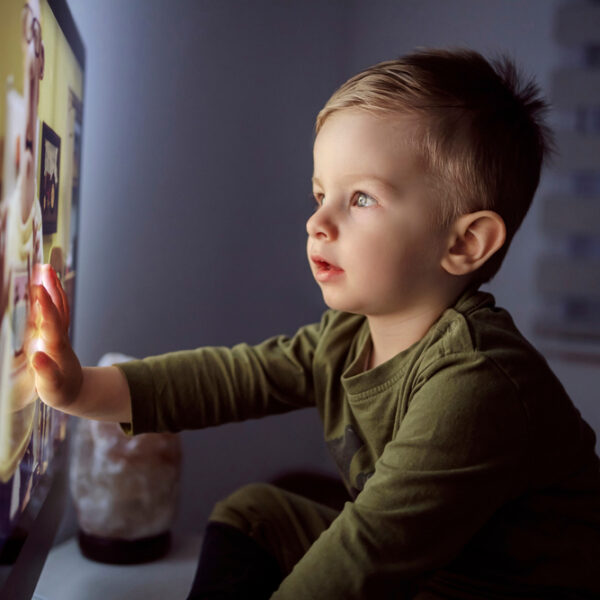 Child watching TV ads