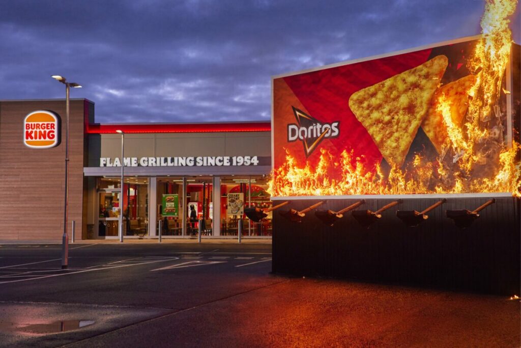 Doritos has unveiled a new collaboration with Burger King by setting fire to its own out-of-home (OOH) billboard.