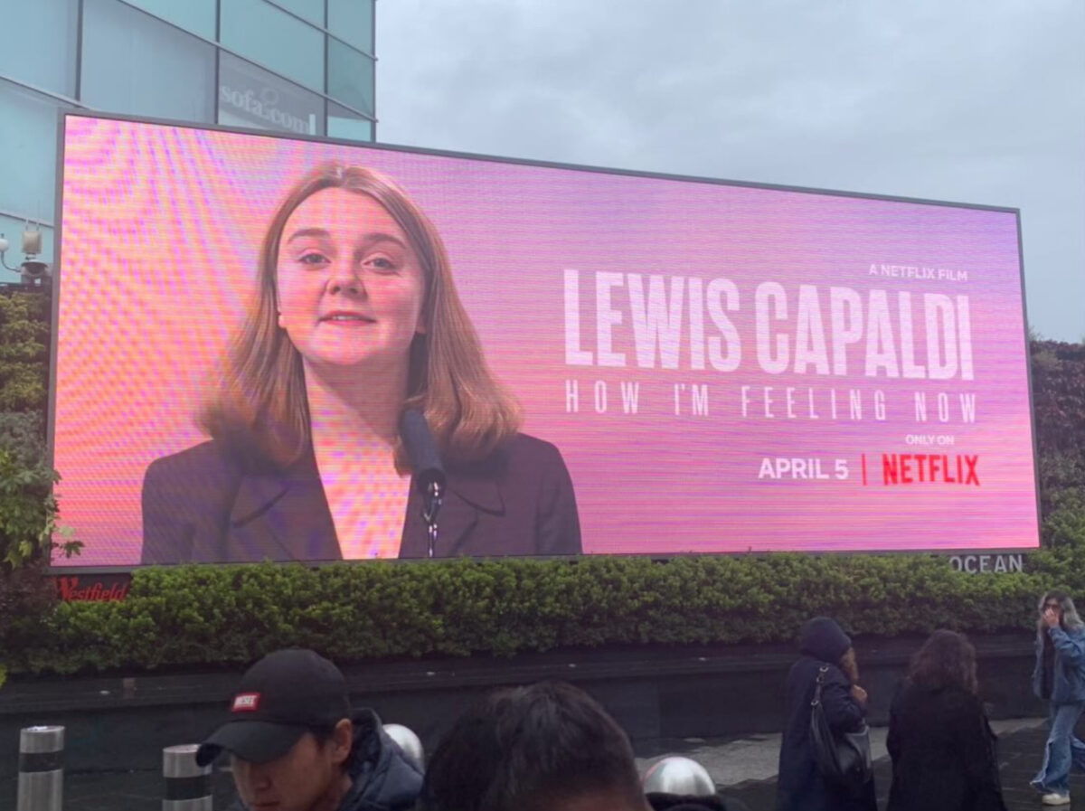 Lewis Capaldi has joked that Netflix should 'fire' its advertising team after it mixed up an image of him and a young Liz Truss in a billboard ad.