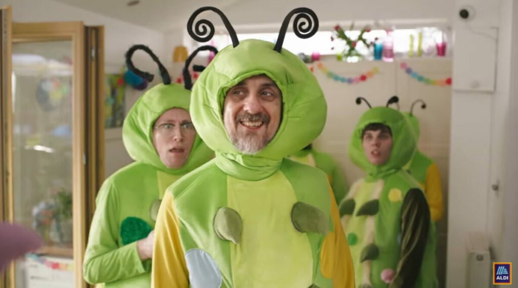 Aldi has once again taken aim at MS' Colin the Caterpillar Cake, using a King Charles III coronation advertisement to poke fun at the retailer.