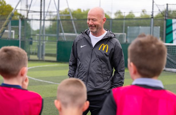 Shearer plays with football with children in McDonald's latest ad