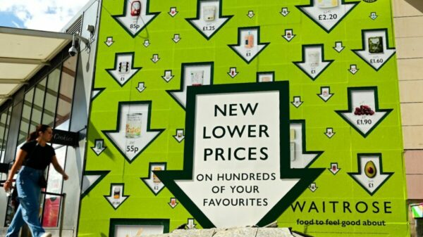 Waitrose' new 3D billboard is a vibrant green billboard that shows the supermarket's new price cuts