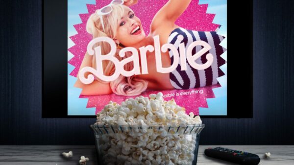 Depicting the Barbie Movie, featuring Margot Robbie, in front of a bowl of popcorn