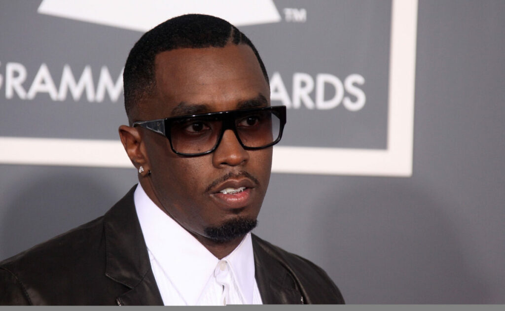 Diageo, has accused Sean "Diddy" Combs of attempting to force parallel proceedings, saying the racial allegations belong in arbitration, depicted here.