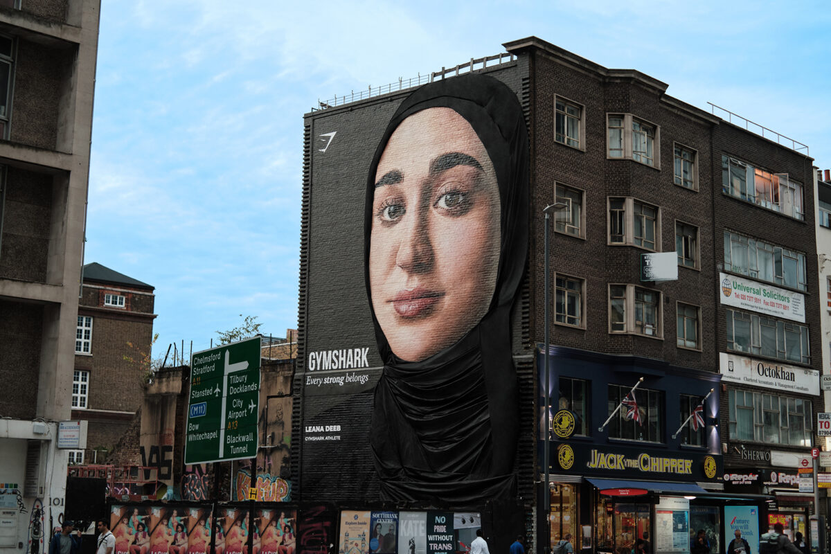 Sportswear brand Gymshark has unveiled the 'world's first modest billboard' new 3D out-of-home mural featuring brand ambassador, Leana Deeb, depicted here.