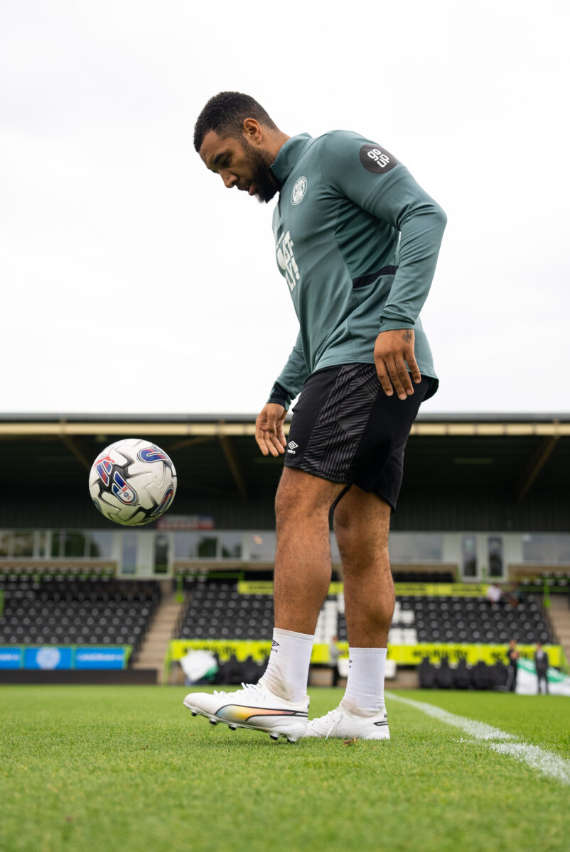 Forest Green Rovers FC has partnered with digital marketing agency Go Up for the third year to deliver the next saga of their commitment to sustainable development, a club player kicking a ball depicted here