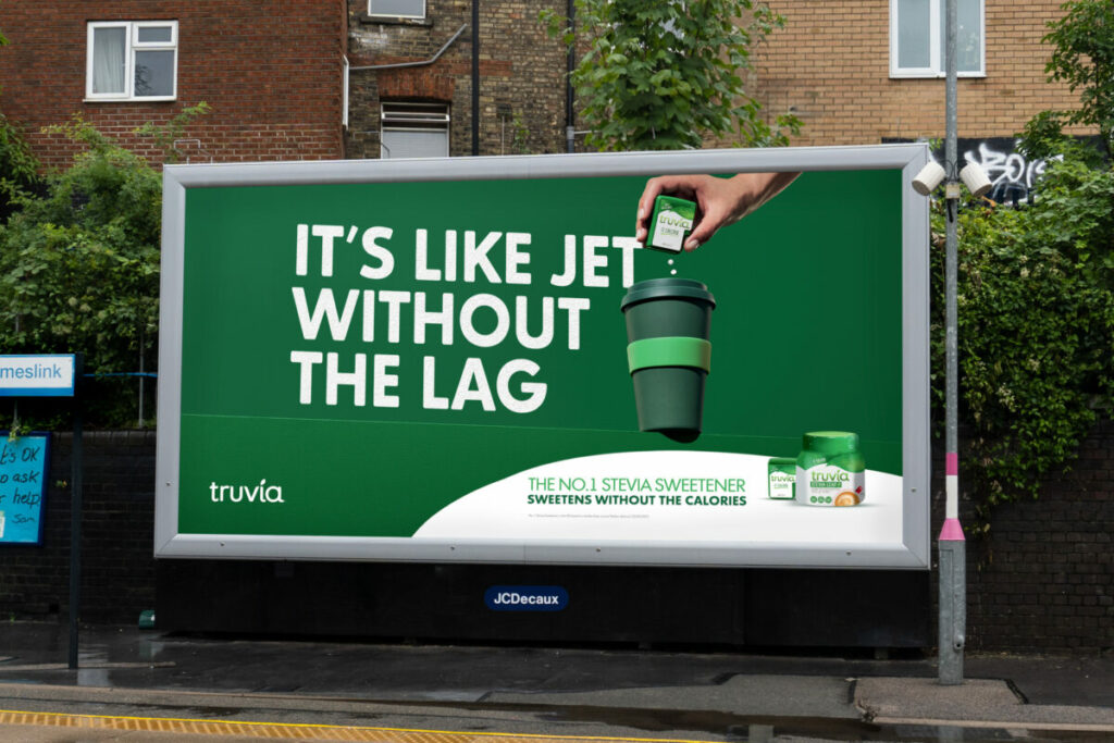 Food giant Silver Spoon has unveiled a new humorous out-of-home (OOH) campaign for Truvia, developed by creative studio Ourselves, here depicting the creative on a green background - with the words 'It's Like Jet without the Lag'