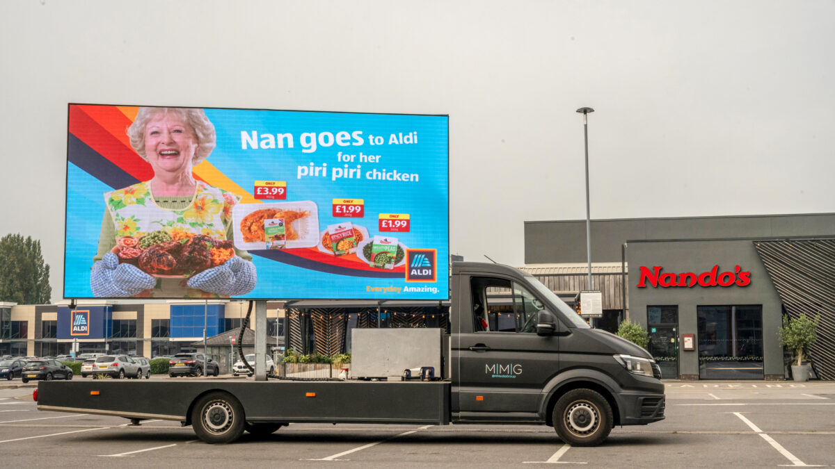 Supermarket giant Aldi has marked the launch of its brand new Nando's inspired range with a tongue-in-cheek stunt aimed at the restaurant chain, depicted here as a ad-van parked outside a Nando's resturant.