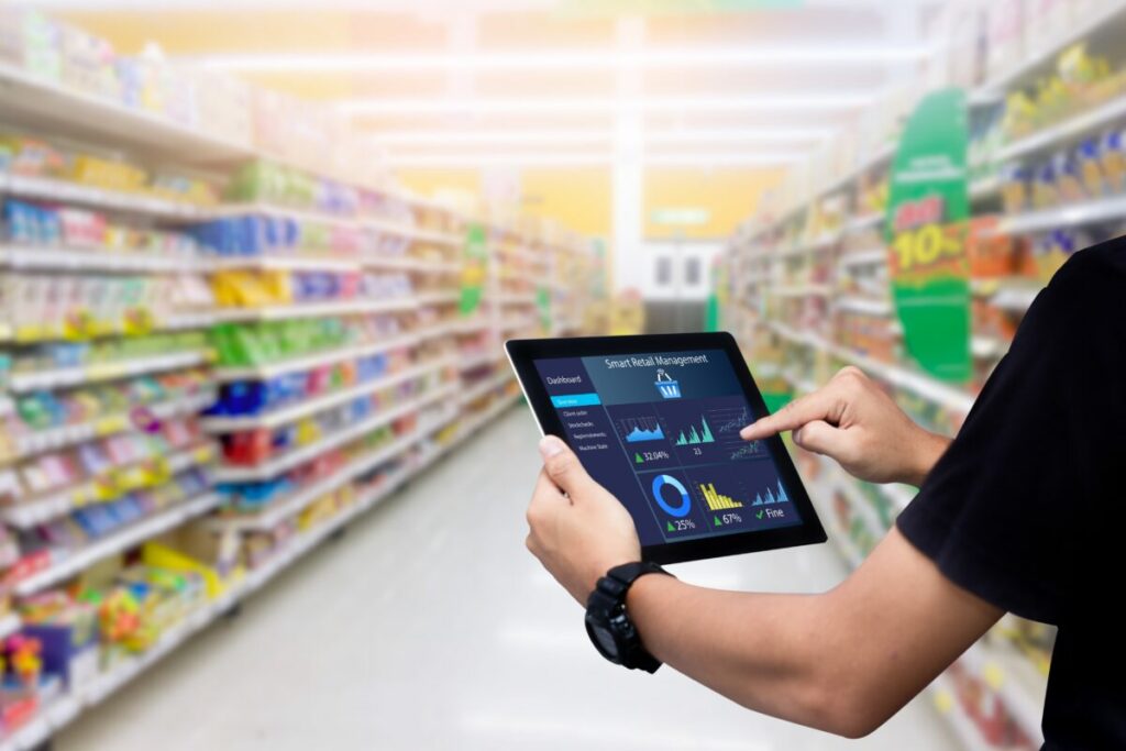 More UK digital advertisers are unlocking the value of retail data to drive sales, with figures revealing over 8 in 10 plan to activate by 2025, here depicting data within a shop.