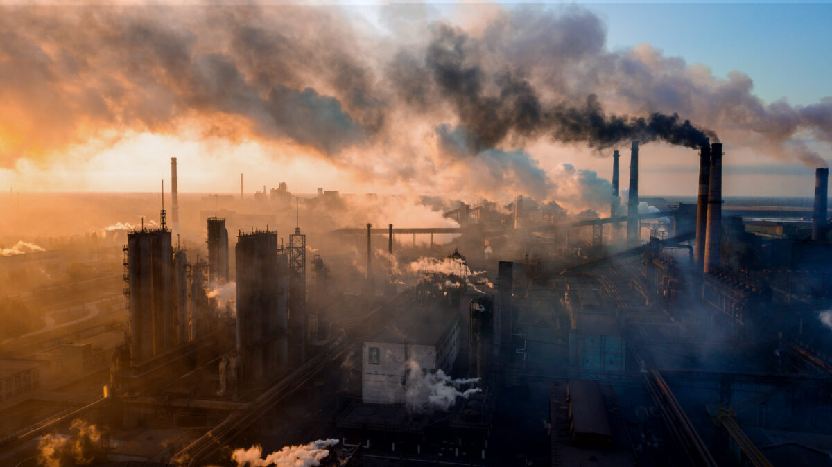 Clean Creatives has revealed a record number of fossil fuel contracts, as ad and PR agencies protect fossil fuel firms, but warns legal liability awaits, depicting a smoggy city