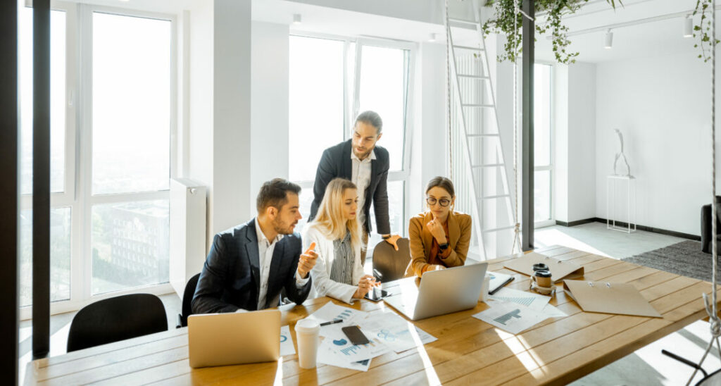 The creative industries were notably absent from this year's Social Mobility Employer Index, making up only a tiny proportion of private sector entrants, depicted here employees around a table