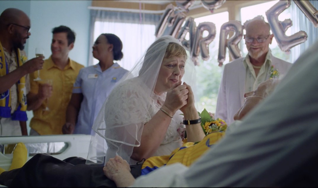 Marie Curie has unveiled an updated brand platform and strategy, alongside a new advert raising awareness of its work supporting end-of-life care, here depicting a still of people getting married.