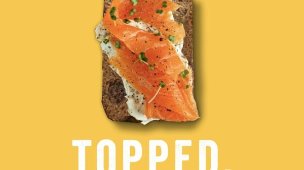 British malt loaf brand Soreen has today unveiled a new campaign leaning its fans' imagination with an ad encouraging consumers to try it "topped", Soreen campaign here depicting salmon and cream cheese and chives over a piece of malt bread. The background is yellow and the text reads "Try Me Topped"