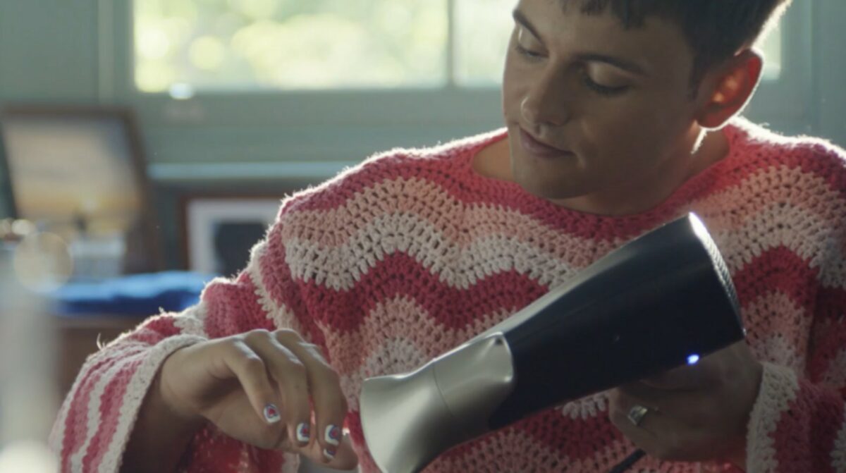 British Gas is flipping sporting stereotypes on their head in a new campaign showing prominent Team GB athletes performing in an attempt to save energy, here depicting Tom Daley dry his nails with a hair dryer