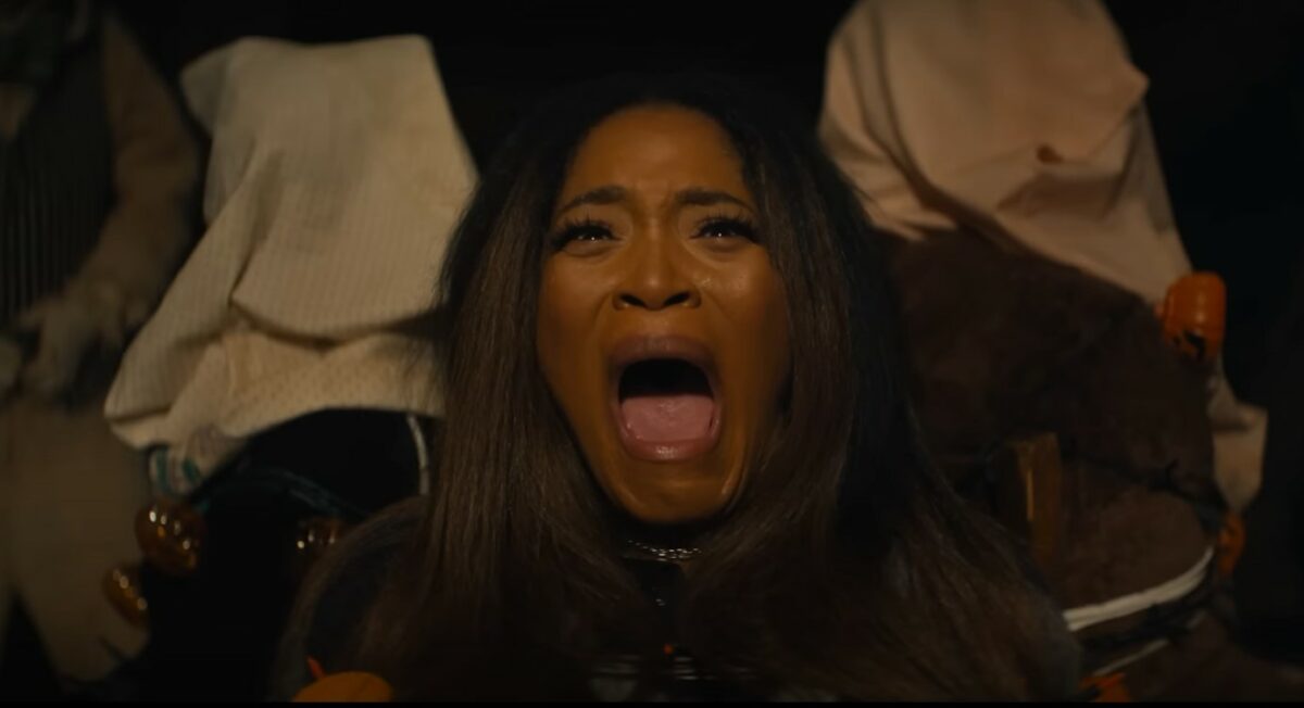An Uber Eats campaign warning about the dangers of running out of treats on Halloween night has been labelled as the 'scariest' advert of all time, here showing a still from the Uber Eats ad where a woman screams in terror