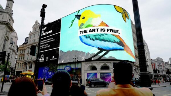 Wunderman Thompson has partnered with charity Hestia to illuminate the realities of modern slavery through the sixth year of their 'Art is Freedom exhibition', here depicted on the Piccadilly lights