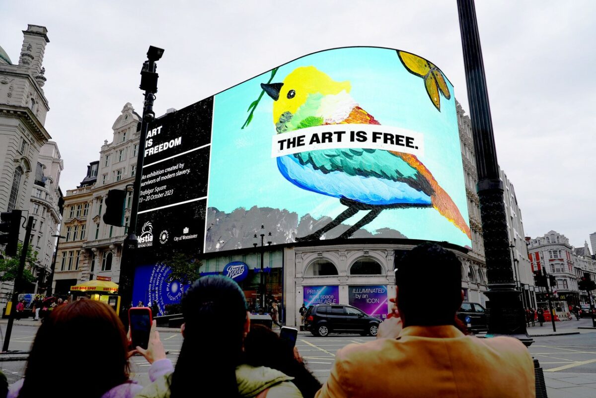Wunderman Thompson has partnered with charity Hestia to illuminate the realities of modern slavery through the sixth year of their 'Art is Freedom exhibition', here depicted on the Piccadilly lights