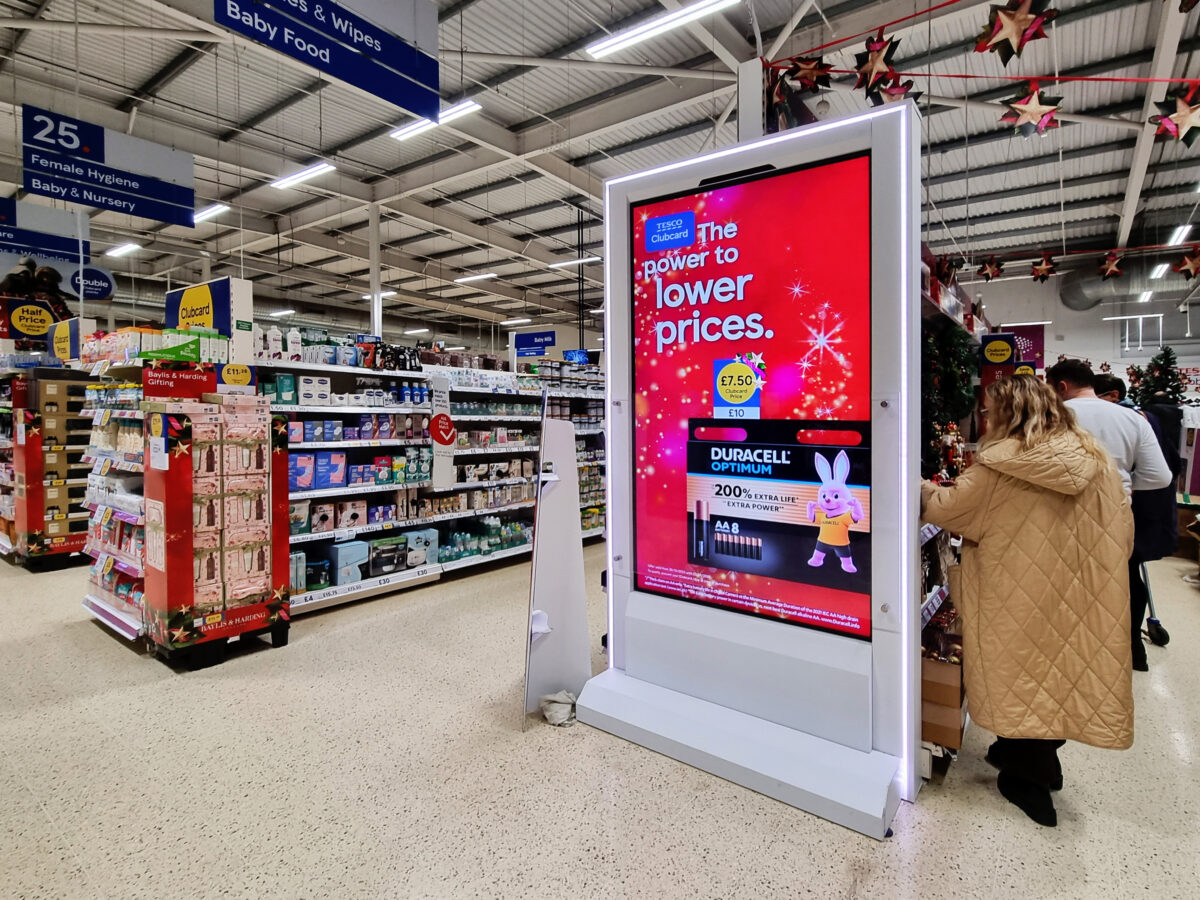 Tesco ad screen: the supermarket is significantly expanding its in-store digital advertising network with the addition of its 1,800th screen - making it the largest in the UK.