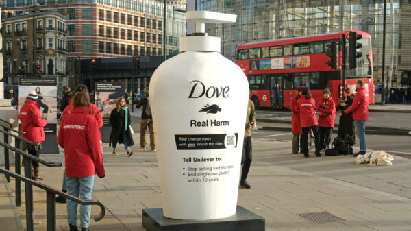 A giant dove buttle with a dead bird and slogan 'Real Harm'. Greenpeace has planted a subversive redesign of the iconic Dove branding outside Unilever’s headquarters, slamming the company for its shocking use of single use plastic.