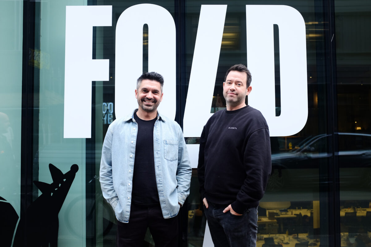 Fold 7 poaches creative directors Dom Moira and Kieron Roe to bolster its award-winning team. They are pictured in casual clothes outside the agency.