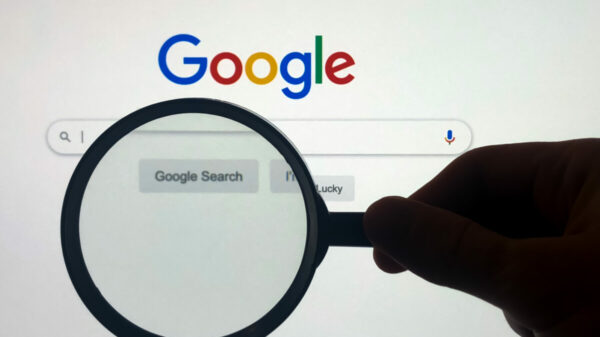 Google search engine with magnifying glass, illustrating that Google has run hundreds of adverts on hundreds of questionable sites, including those that play host to pornographic, zoophilic and pirated content.