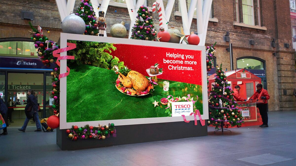 Tesco brought its festive TV advert to life with an OOH activation at Kings Cross station in a bid to help commuters 'become more Christmas'.
