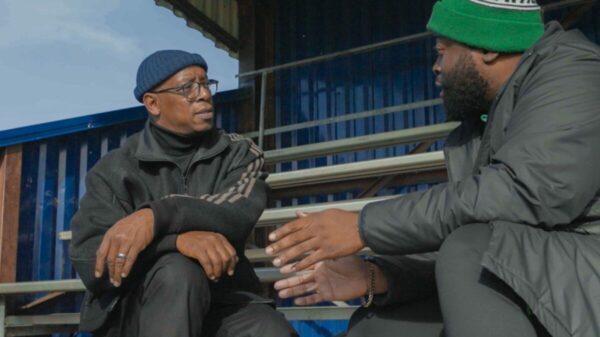 Ian Wright with Grenfell Athletic FC founder. A new Cadbury film tells the emotive story of the club.