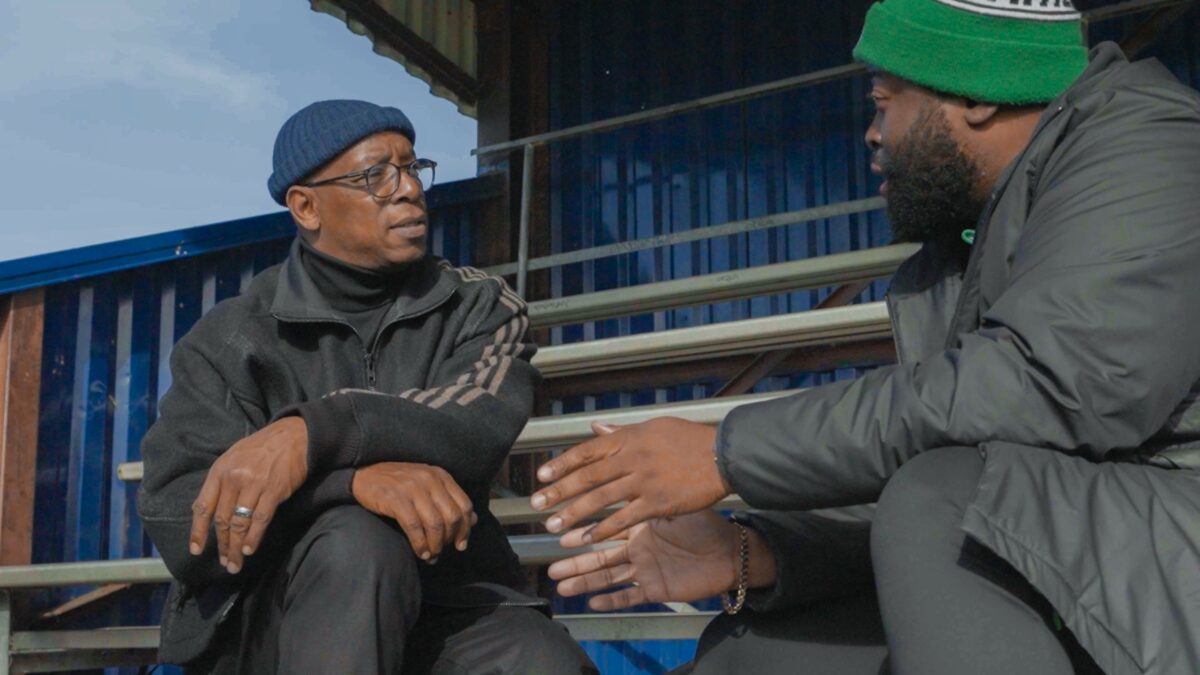 Ian Wright with Grenfell Athletic FC founder. A new Cadbury film tells the emotive story of the club.