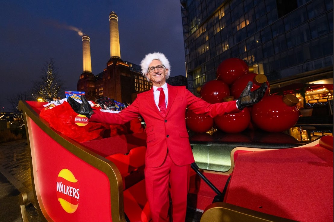 Gary Lineker in front of Walkers sleigh at Battersea Power Station. Gary Lineker caught the attention of the public by driving a Walkers-themed sleigh around Battersea power station, marking the football legend’s 30th year with the brand.