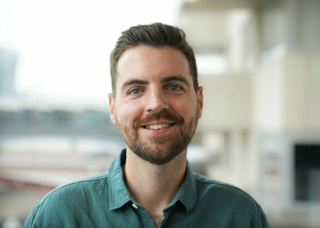 John Harding Easson in blue/green shirt smiling. Ogilvy PR has promoted John Harding-Easson to the role of head of influence, EMEA.