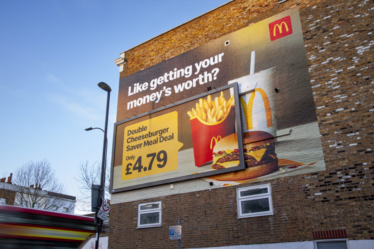 As we head into a general election, Marketing Beat explores why it's not just overtly political billboards that shape our social values, and examines why their presence holds such power. McDonald's oversized billboard, formed when Leo Burnett and McDonalds joined forces to create an oversized billboard, which cheekily gets its money's worth by spreading on to a nearby wall. 