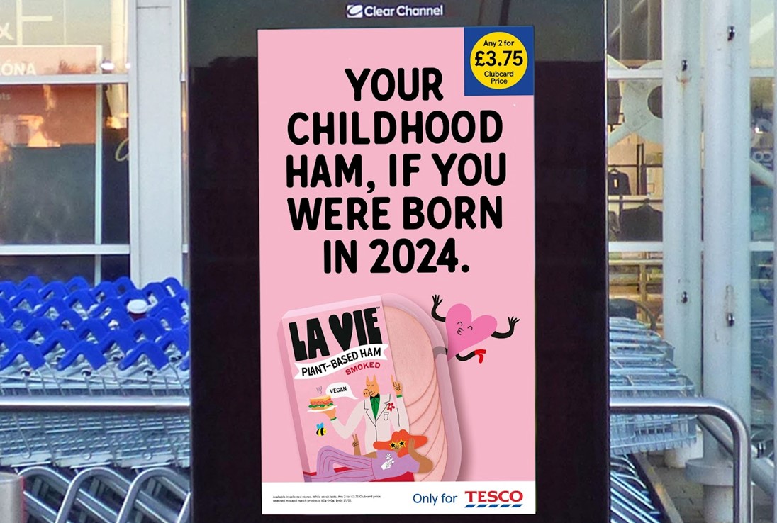 French plant-based pork brand La Vie has launched a playful new campaign to feature in Tesco stores, with tongue-in-cheek slogans including Image of Tesco and La Vie billboard. "Source of protein, fibre and endless debates".
