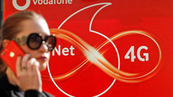 Image of lady in sunglasses in fromt of vodafone branding. Vodafone has appointed Leo Burnett as its new strategic and creative agency, following a highly competitive pitch process.