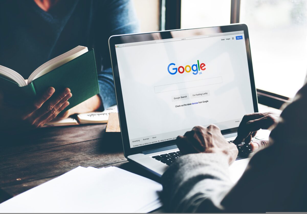 Person searching on Google. Google is set to give advertisers greater control over ad placement within its Search Partner Network.