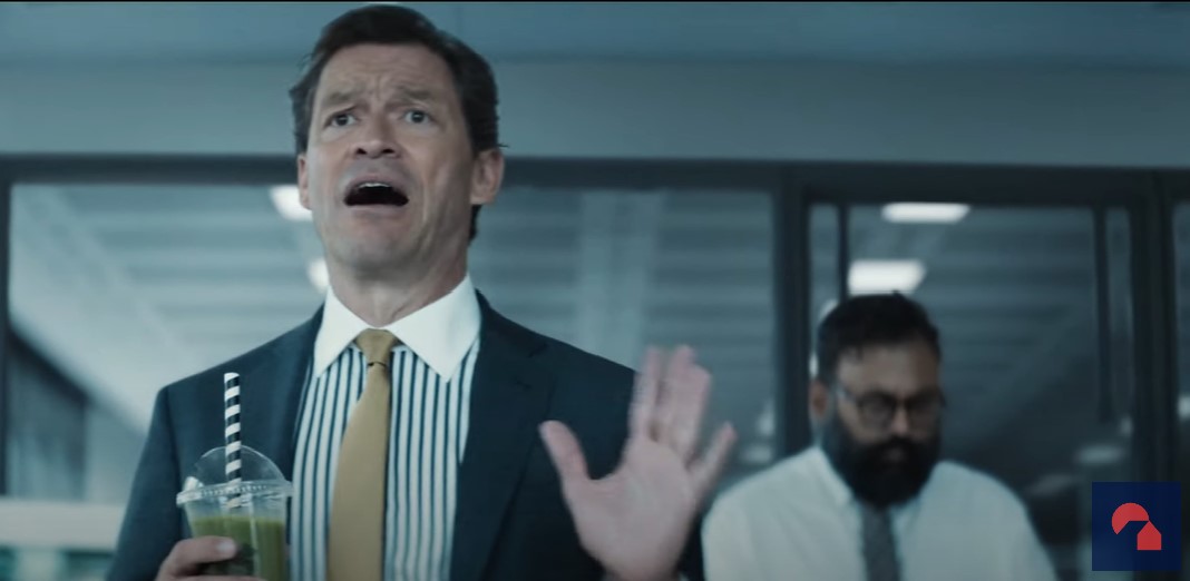 Nationwide has turned to AI to assist with its communications after two of its adverts were banned for being misleading. Screenshot from the Nationwide ad which features dominic west holding a green smoothie and gesticulating, performing the arrogant banker. Next to him is Sunil Patel playing a smartly dressed assistant. N