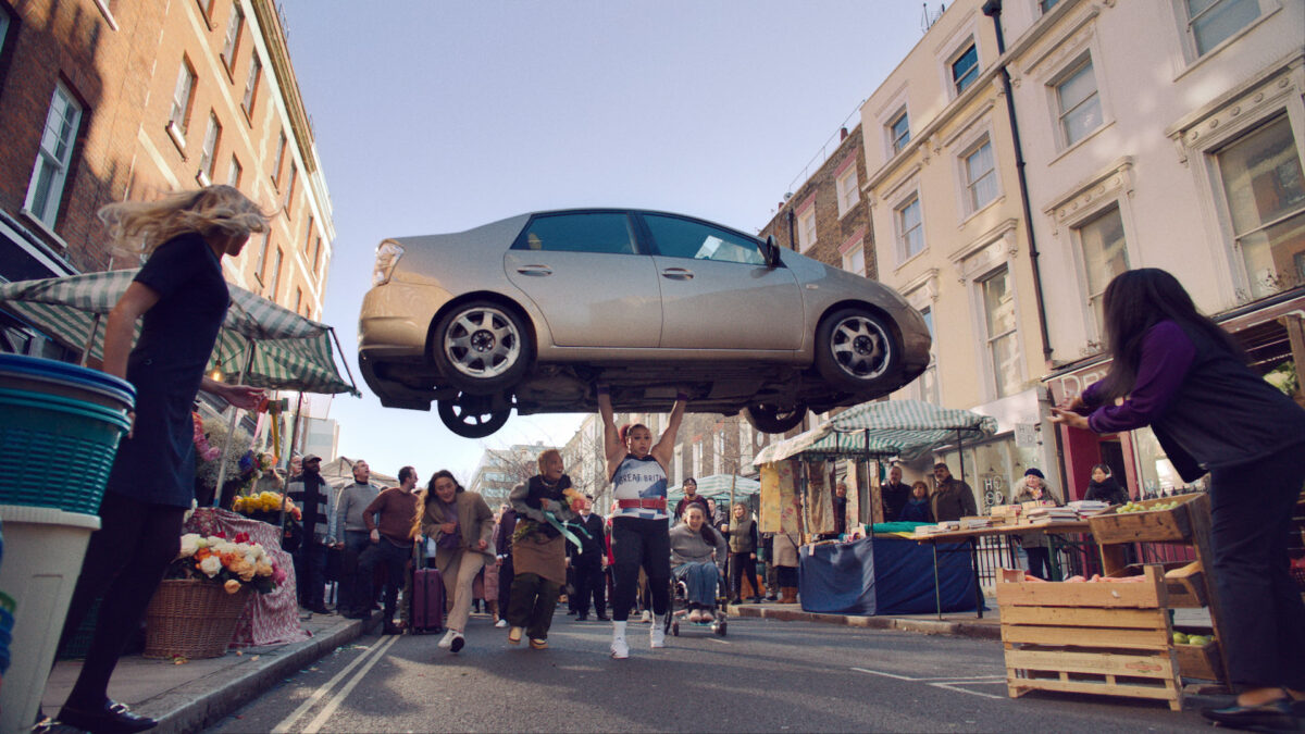 Still from campaign showing Emily Campbell lifting a car. Natwest has shared a new TV ad in partnership with Team GB in the run up to the Paris 2024 Olympics.