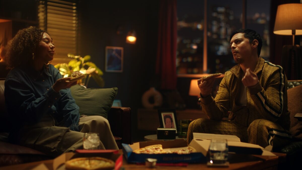 Snap from Domino's new ad, showing a man praising his pizza with Italian hand gestures. Domino's has launched a new spot inviting people to 'Feast Like A Don' and indulge in an Italian-inspired comfort food experience.