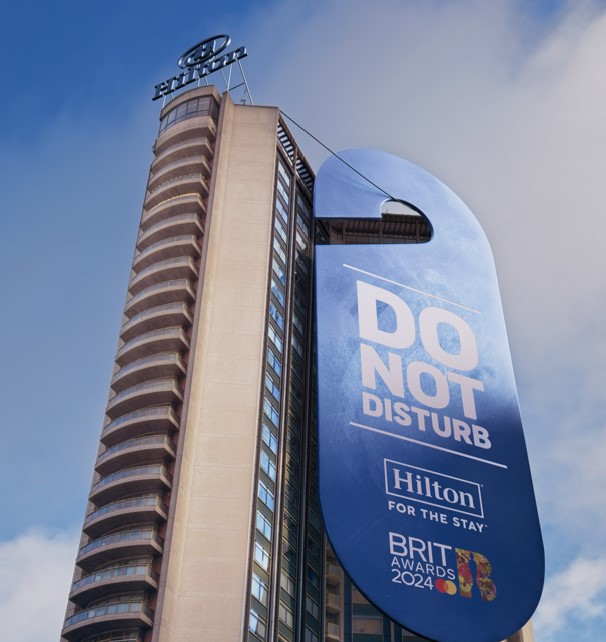 Hilton Park Lane is the latest brand to embrace the potential of fake OOH adverts with a giant 'Do Not Disturb' sign hanging off the hotel.