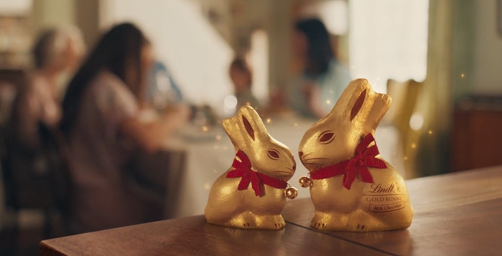 Lindt Easter bunnies in gold foil. Lindt has unveiled its newest advert, capturing the spirit of the Easter bunny in its gold foil and red ribbon.