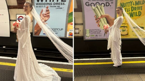 A bride stands in front of a Mooncup campaign. It's a brave move as she is wearing a mooncup in her wedding dress. She is smiling. The poster behind features text about the campaign and a hand holding tampons, another holding a mooncup. Period care brand Mooncup has launched a brand new advertising campaign across London Underground, featuring a full page break up letter from a vagina to a tampon.