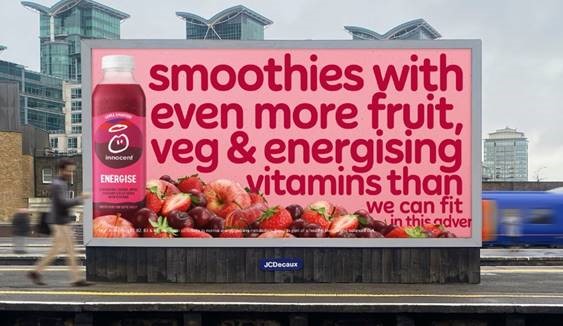 New Innocent spot squeezes as many vitamins in as it can. Billboard reads "smoothies with even more fruit, veg and energising vitamins than we can fit in this space".