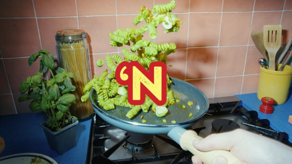 A large N' on top of a photo of someone sizzling up some bright green pasta. Crisp 'N Dry has shared a new campaign featuring a fast paced tune which heroes the brands iconic 'N to showcase the many uses of the rapeseed oil.