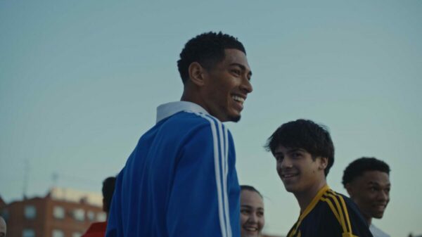 Bellingham smiles as he plays with community members at a local football club. Adidas draws together Lionel Messi, Jude Bellingham and Florian Wirtz in its latest brand film, designed to raise awareness of the impact of pressure in sport in the run up to Euro 2024.