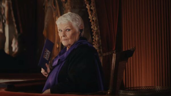Judi Dench in a premium seat at the opera, holding her Moneysupermarket deal. Money Supermarket has shared its latest ad directed by Shakespeare In Love director John Madden, starring Judi Dench at the opera.