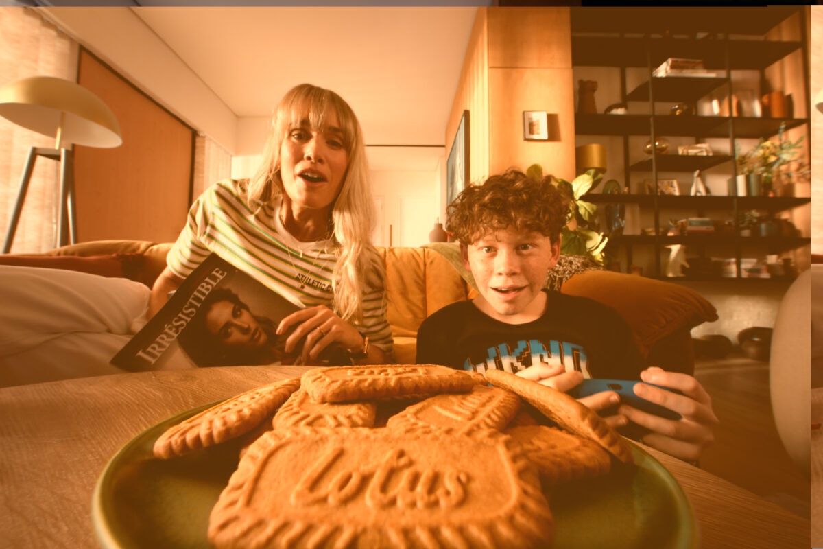 A mother and son sit at the sofa with an enticing plate of Lotus right in their vision. Lotus spotlights its golden brown colour and unique crunchy texture in its latest ad highlighting how Biscoff products can be craving-inducers, via a technique it has called "Point of Biscoff".