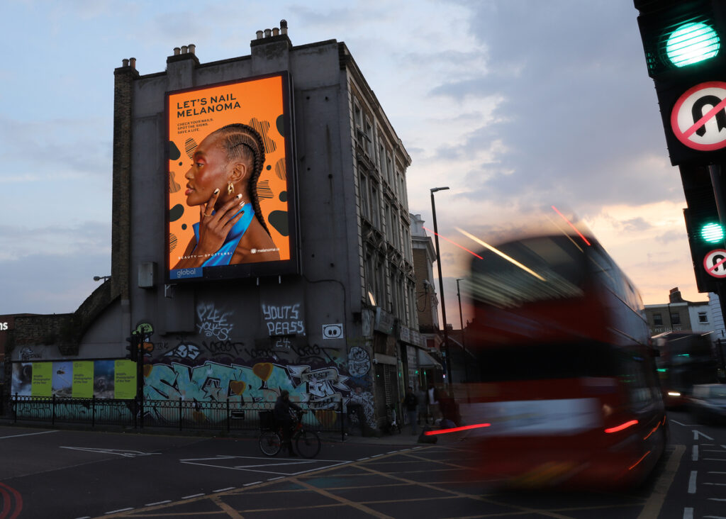 A bold poster reads "Let's nail melanoma' as part of an awareness-driving campaign seeking to involve nail technicians and beauty experts in checking for the condition. Melanoma UK and T&Pm have launched a new campaign to bust misconceptions around skin cancer, featuring an awareness-driving nail sticker kit.