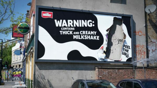 Billboard features a Frijj Milkshake shaped hole which has been ripped through as if the milkshake's been snatched, a cow patterned background and the words Warning: contains thick and creamy milkshake. Frijj is bringing its iconic "Feel the Urjj" tagline to life with a cow-themed set of billboards, in order to big up the enticing power of its milkshake.