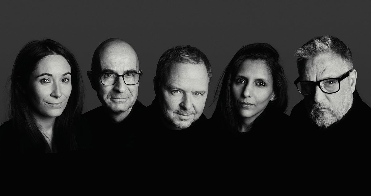 Rankin employees shown, and founder himself. All photographed against a striking grey backdrop, looking serious. Rankin is rebranding to The Hunger, in a move which brings together Hunger magazine (also founded by the iconic photographer) and its post-production, agency and entertainment capabilities.