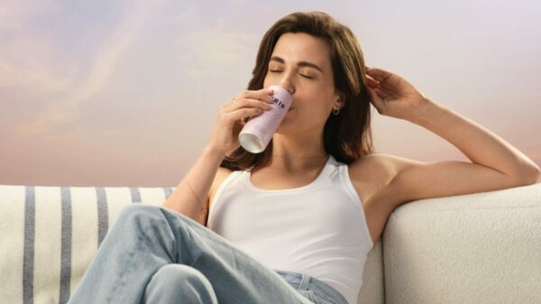 A woman lounges back on a stylish looking sofa in comfortable bagging jeans in calming surroundings, she is sipping on a Trip CBD drink. Trip has launched its first ever £multi-million ad campaign in an effort to showcase how the CBD-infused drink can help viewers find their calm.