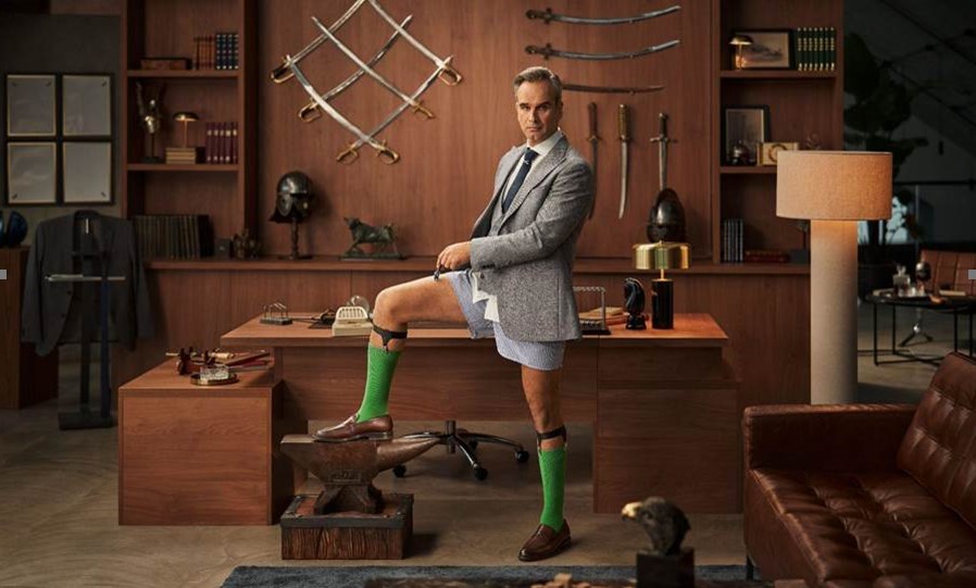 A man dressed in a suit jacket, with an old fashioned haircut, green socks and pants proudly poses in a crafty looking room where razors are made. Wilkinson Sword has introduced a new brand character in its latest spot, which playfully highlights the importance of a high quality razor, as part of a move to disrupt the category.